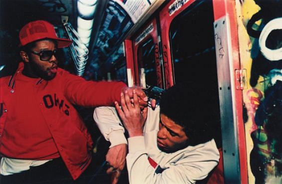 Bruce Davidson
Undercover Police Officer in Red Jacket, with Gun, New York, 1985
dye transfer print
14 3/4 x 22 1/4 in. (37.5 x 56.5 cm)
From "Subway" series