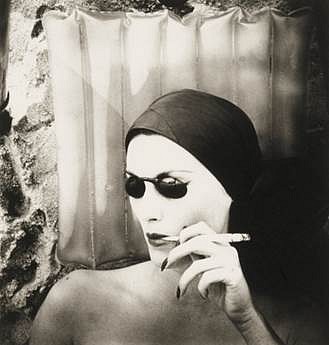 Irving Penn - Woman in the Beach, Smoking (Mary Jane Russell, Long Island, N.Y.)