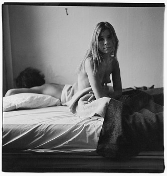 Diane Arbus - Girl sitting in bed with her boyfriend, N.Y.C.